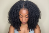 Enhanced kinky curly wig with improved clarity
