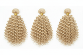 Three warm 613 blonde curly hair bundles with gold bands side by side
